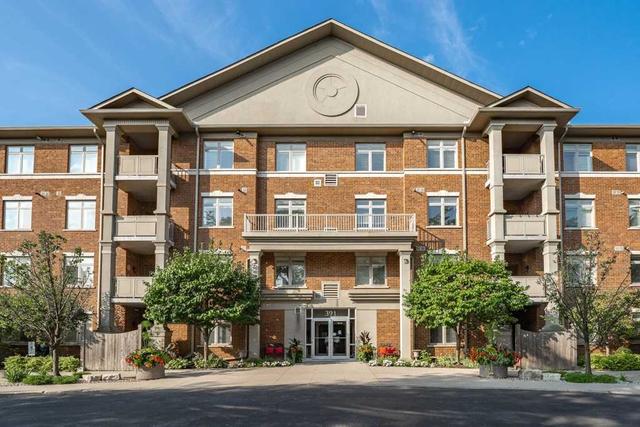 102 - 391 Plains Rd E, Condo with 2 bedrooms, 2 bathrooms and 1 parking in Burlington ON | Image 1