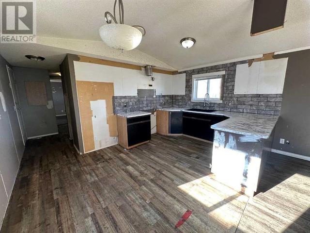 12, - 5211 55 Avenue, House other with 3 bedrooms, 1 bathrooms and 2 parking in Rocky Mountain House AB | Image 3