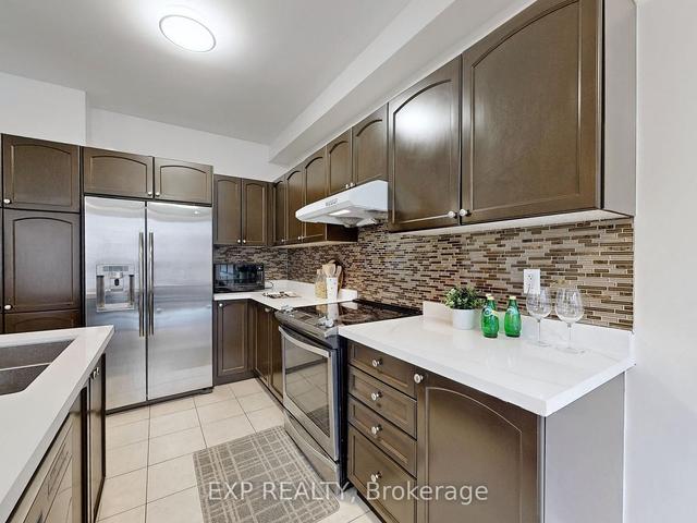 31 Tufo Ave, House attached with 4 bedrooms, 3 bathrooms and 3 parking in Markham ON | Image 2