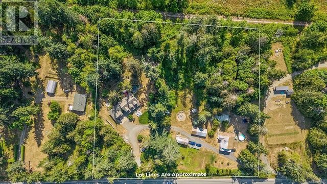 6249 Island Hwy, House detached with 3 bedrooms, 3 bathrooms and 8 parking in Comox Valley A BC | Image 70