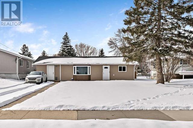 77 2 Street Se, House detached with 2 bedrooms, 1 bathrooms and 4 parking in High River AB | Image 1