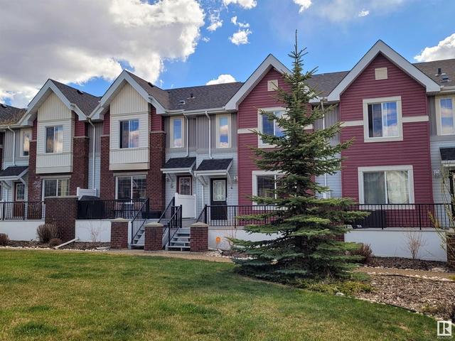 4, - 2336 Aspen Trail, House attached with 3 bedrooms, 1 bathrooms and null parking in Edmonton AB | Card Image