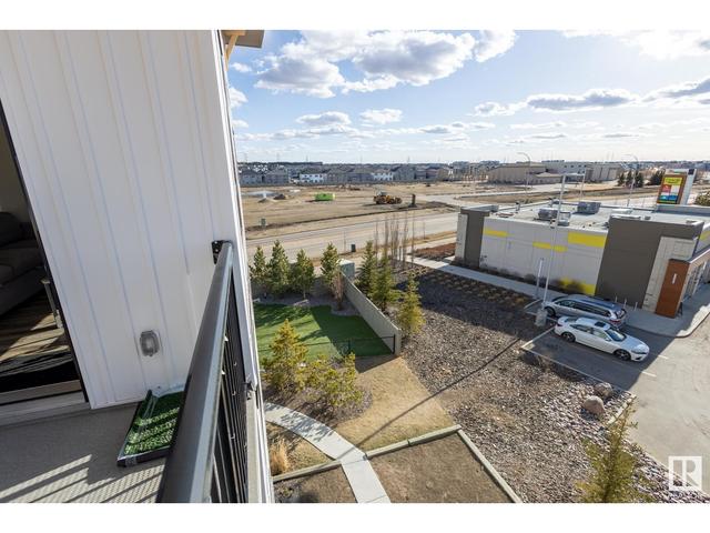 402 - 1506 Tamarack Bv Nw, Condo with 2 bedrooms, 2 bathrooms and 1 parking in Edmonton AB | Image 2
