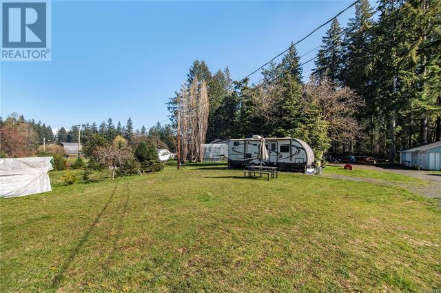 7997 Island Hwy N, House detached with 4 bedrooms, 3 bathrooms and 5 parking in Comox Valley C (Puntledge   Black Creek) BC | Image 38