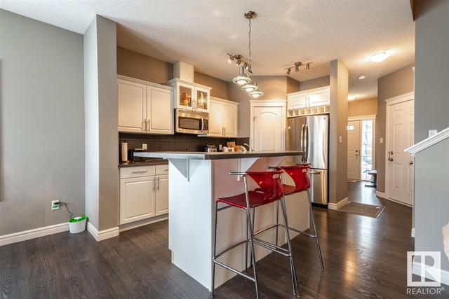 11405 13 Av Sw, House semidetached with 3 bedrooms, 2 bathrooms and null parking in Edmonton AB | Image 2