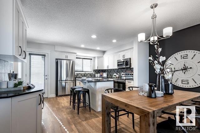 206 Desrochers Bv Sw, House attached with 3 bedrooms, 2 bathrooms and null parking in Edmonton AB | Image 11