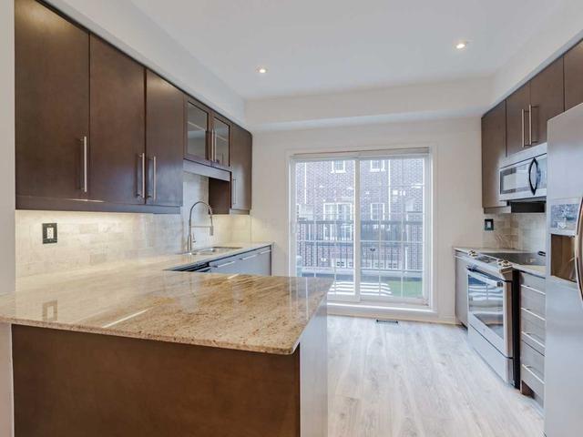 th36 - 99 The Queensway, Townhouse with 3 bedrooms, 2 bathrooms and 1 parking in Toronto ON | Image 21