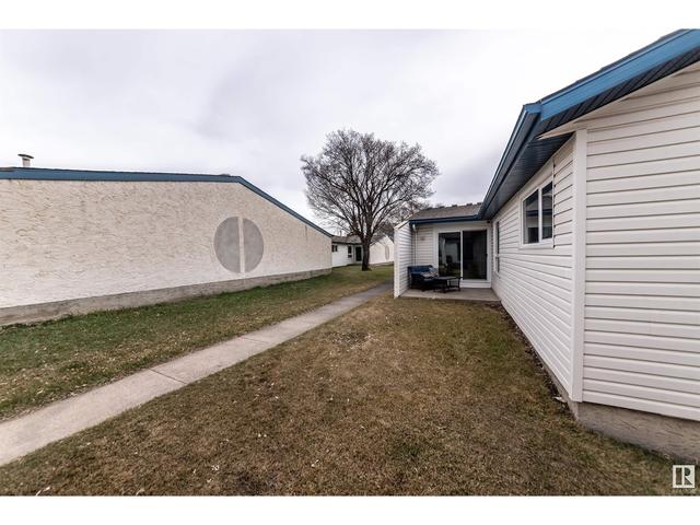 1093 Millbourne Rd E Nw, House attached with 3 bedrooms, 1 bathrooms and 2 parking in Edmonton AB | Image 40