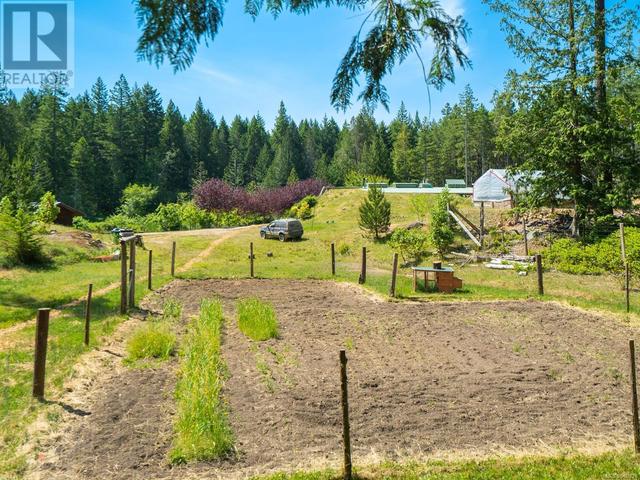newly tilled garden space by the pond & tree fort | Image 55