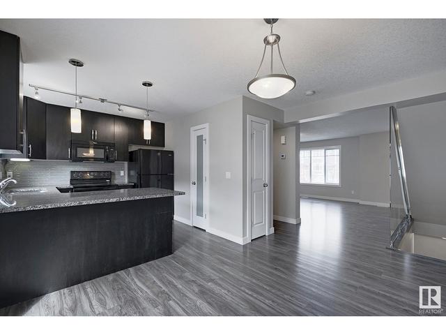 100 - 9535 217 St Nw, House attached with 3 bedrooms, 2 bathrooms and null parking in Edmonton AB | Image 12