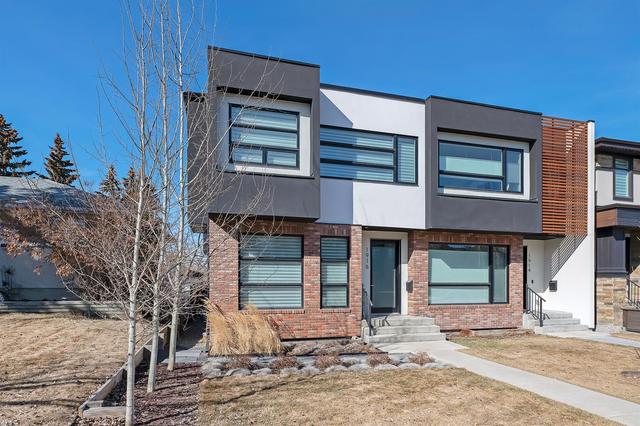 1916 48 Avenue Sw, Home with 4 bedrooms, 3 bathrooms and 2 parking in Calgary AB | Image 1