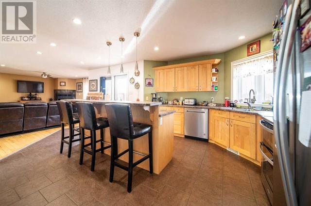 14, - 65016 Twp Rd 442, House detached with 6 bedrooms, 4 bathrooms and 10 parking in Wainwright No. 61 AB | Image 8