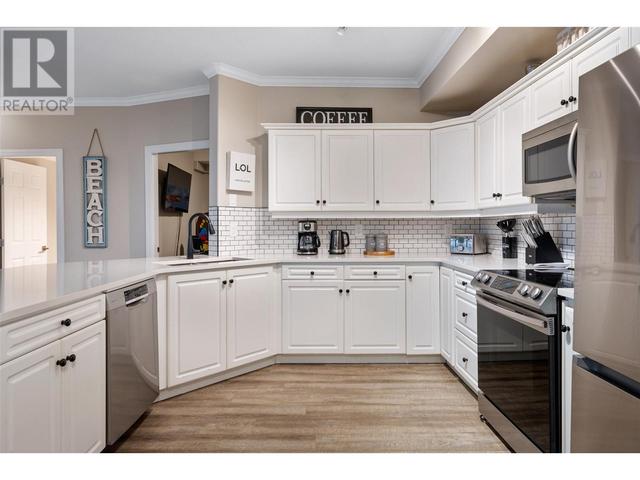 334 - 1088 Sunset Drive, Condo with 3 bedrooms, 2 bathrooms and 2 parking in Kelowna BC | Image 2
