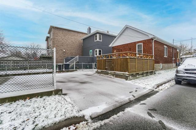 93 Twenty Second St, House detached with 2 bedrooms, 2 bathrooms and 4 parking in Toronto ON | Image 26