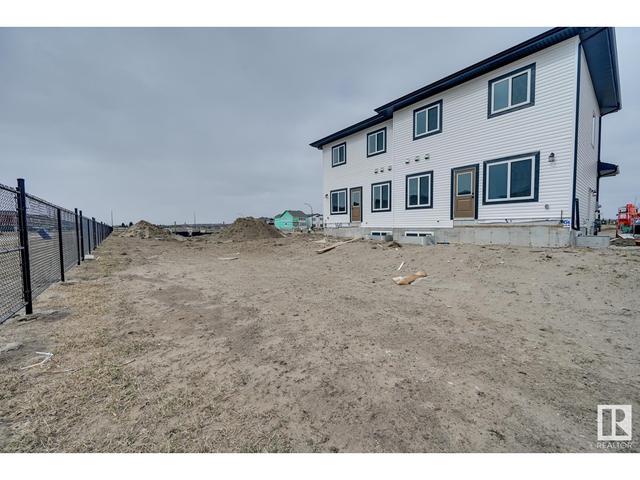 105 Elm St, House semidetached with 3 bedrooms, 2 bathrooms and 4 parking in Fort Saskatchewan AB | Image 32