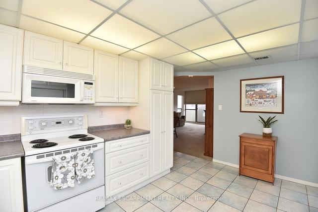309 - 5070 Pinedale Ave, Condo with 2 bedrooms, 2 bathrooms and 1 parking in Burlington ON | Image 2