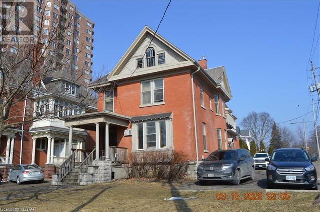 334 Queens Avenue, Home with 10 bedrooms, 3 bathrooms and 5 parking in London ON | Image 1