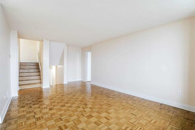 1209 - 11 Wincott Dr, Condo with 3 bedrooms, 2 bathrooms and 1 parking in Toronto ON | Image 9