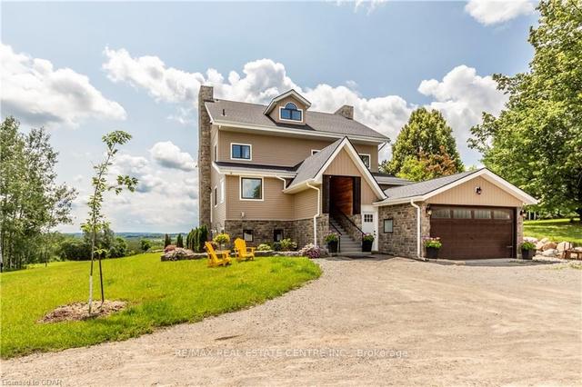 6973 Seventh Line, House detached with 3 bedrooms, 5 bathrooms and 22 parking in New Tecumseth ON | Image 31