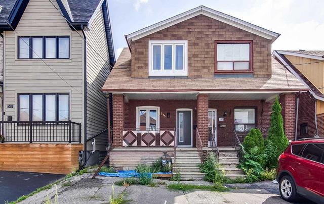 515 Northcliffe Blvd, House semidetached with 3 bedrooms, 2 bathrooms and 2 parking in Toronto ON | Image 1