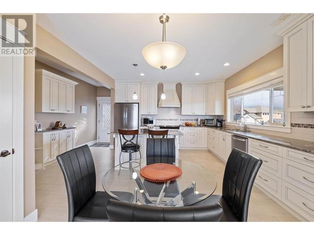 1297 Tanemura Crescent, House detached with 4 bedrooms, 4 bathrooms and 3 parking in Kelowna BC | Image 35