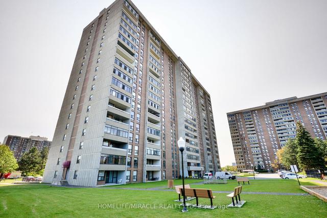 410 - 25 Kensington Rd, Condo with 2 bedrooms, 1 bathrooms and 1 parking in Brampton ON | Image 1