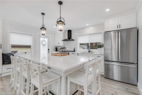 Modern kitchen with stainless steel appliances | Card Image