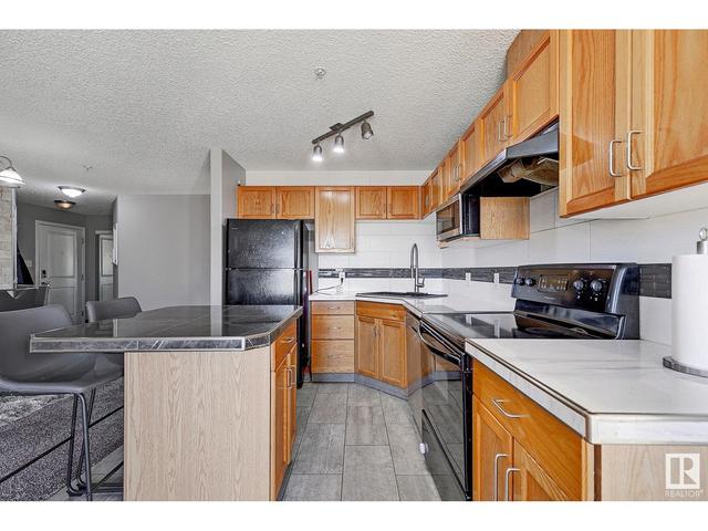 425 - 11325 83 St Nw, Condo with 2 bedrooms, 2 bathrooms and 2 parking in Edmonton AB | Image 12