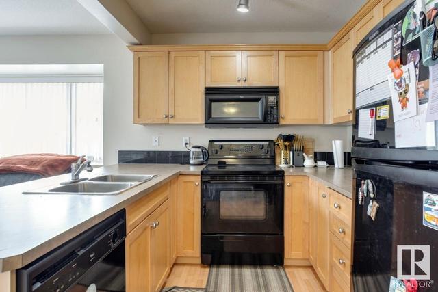 7 - 230 Edwards Dr Sw, House attached with 2 bedrooms, 1 bathrooms and 2 parking in Edmonton AB | Image 9