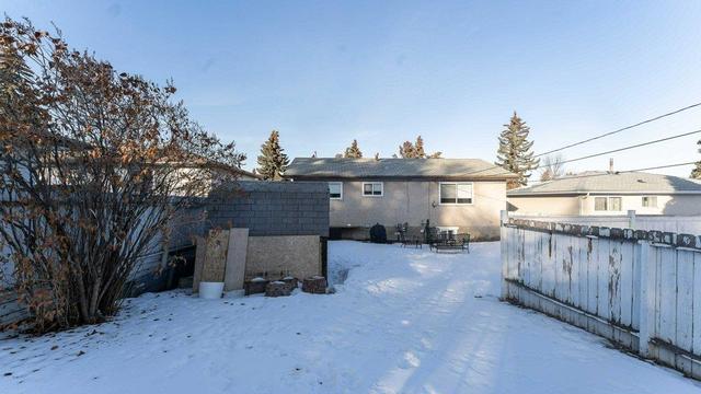 215 Tache Avenue Nw, House detached with 5 bedrooms, 2 bathrooms and 4 parking in Calgary AB | Image 36