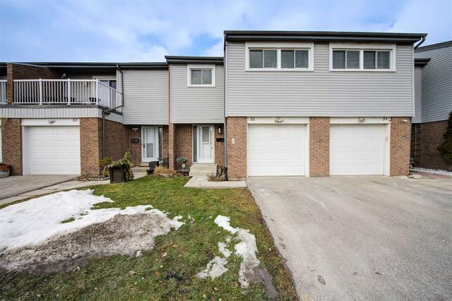 500 Osgoode Dr N, Townhouse with 4 bedrooms, 2 bathrooms and 2 parking in London ON | Card Image