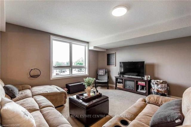 202 - 904 Paisley Rd, Townhouse with 2 bedrooms, 2 bathrooms and 1 parking in Guelph ON | Image 27
