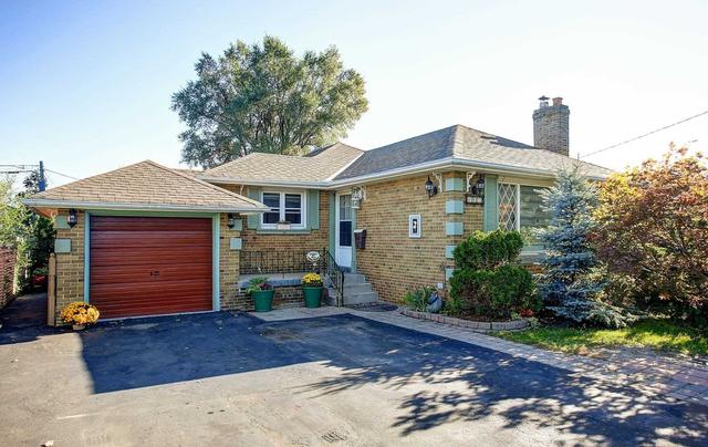 4007 Bloor St W, House detached with 3 bedrooms, 2 bathrooms and 6 parking in Toronto ON | Image 1