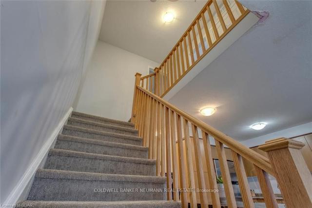 48 Waterford Dr, Townhouse with 4 bedrooms, 3 bathrooms and 2 parking in Guelph ON | Image 4