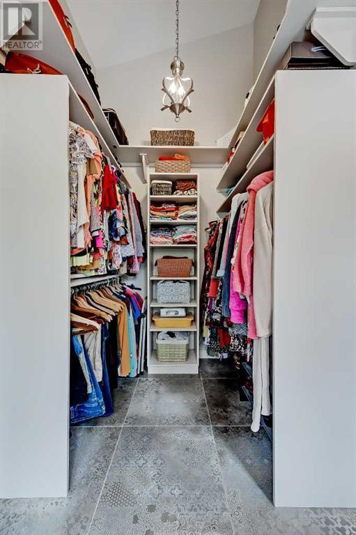 Walk-in Closet with Built-ins | Image 36