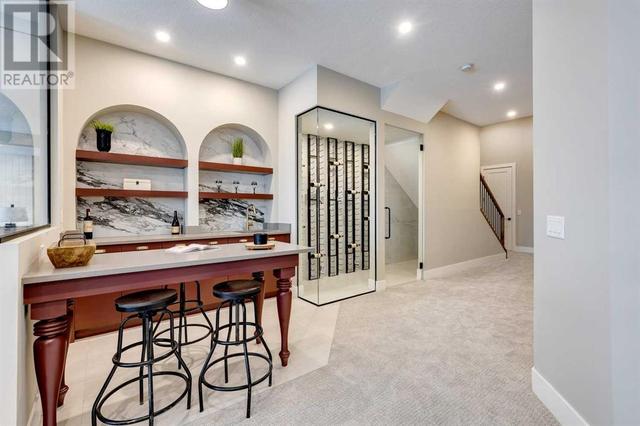 SECOND WET BAR INTHE FINISHED WALK-OUTBASEMENT | Image 33