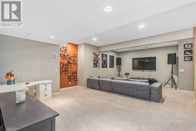 128 Mike Ralph Way Sw, House detached with 4 bedrooms, 3 bathrooms and 2 parking in Calgary AB | Image 41