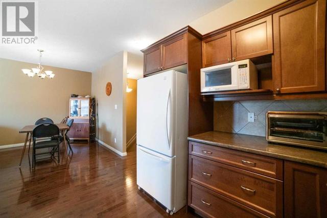 3, - 5015 52 Street, House attached with 2 bedrooms, 1 bathrooms and 1 parking in Camrose AB | Image 12