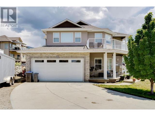 1285 Loseth Drive, House detached with 4 bedrooms, 3 bathrooms and 8 parking in Kelowna BC | Image 32
