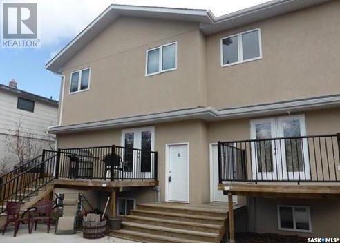 7 - 211 20th Street W, House attached with 2 bedrooms, 1 bathrooms and null parking in Prince Albert SK | Image 1