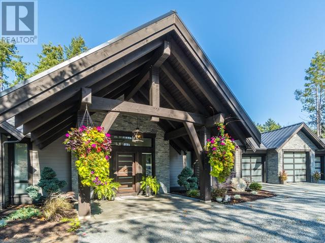 2655 Steve Ellis Rd, House detached with 7 bedrooms, 7 bathrooms and 4 parking in Nanaimo C BC | Image 1