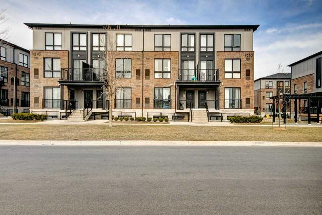 107 - 1210 Main St E, Townhouse with 2 bedrooms, 3 bathrooms and 2 parking in Milton ON | Image 1