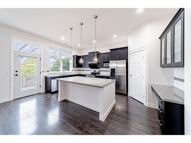 10553 Delsom Crescent, House detached with 7 bedrooms, 5 bathrooms and 4 parking in Delta BC | Image 6