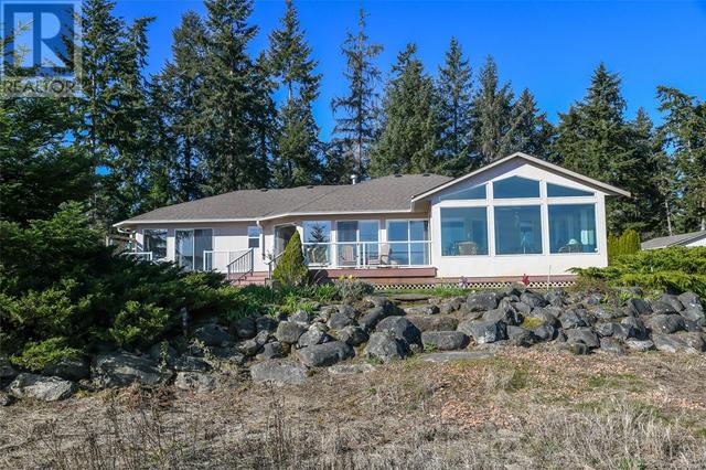 501 Arbutus Bay Rd, House detached with 3 bedrooms, 3 bathrooms and 10 parking in Comox Valley A BC | Image 32