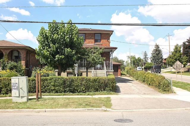 292 Maple Leaf Dr, House detached with 2 bedrooms, 2 bathrooms and 5 parking in Toronto ON | Image 1