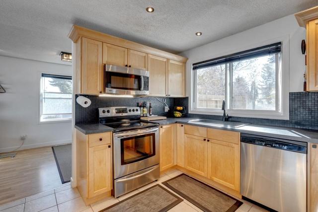 655 Queen Charlotte Drive Se, House detached with 3 bedrooms, 3 bathrooms and 6 parking in Calgary AB | Image 10