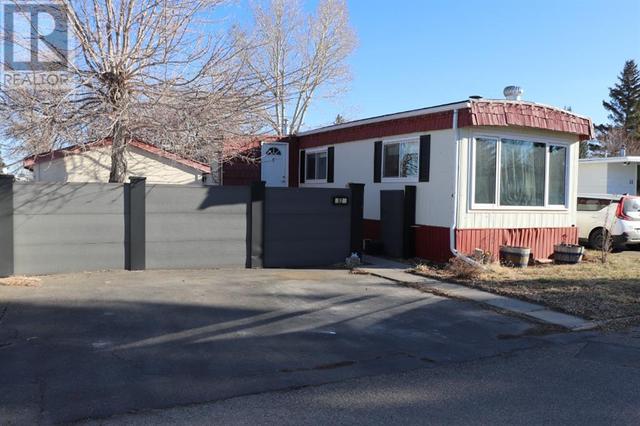 52, - 2300 13 Street N, Home with 2 bedrooms, 1 bathrooms and 2 parking in Lethbridge AB | Card Image
