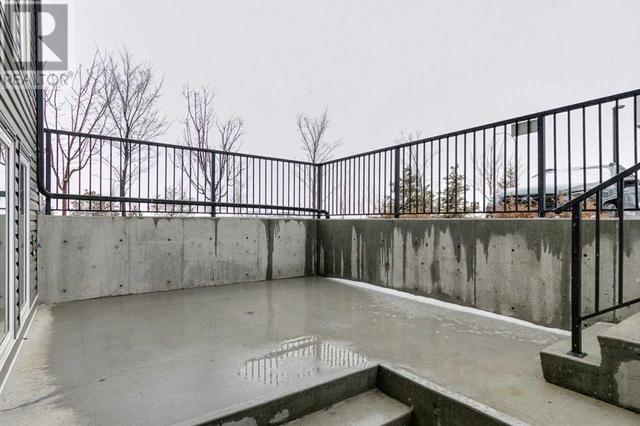 215, - 338 Seton Circle Se, House attached with 2 bedrooms, 1 bathrooms and 1 parking in Calgary AB | Image 18