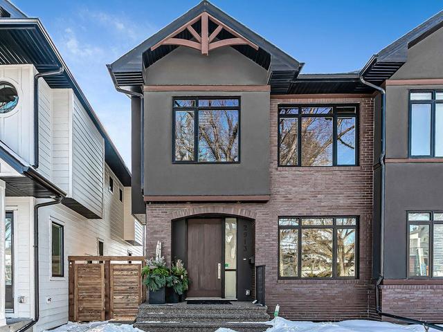 2913 6 Avenue Nw, Home with 4 bedrooms, 3 bathrooms and 4 parking in Calgary AB | Image 1