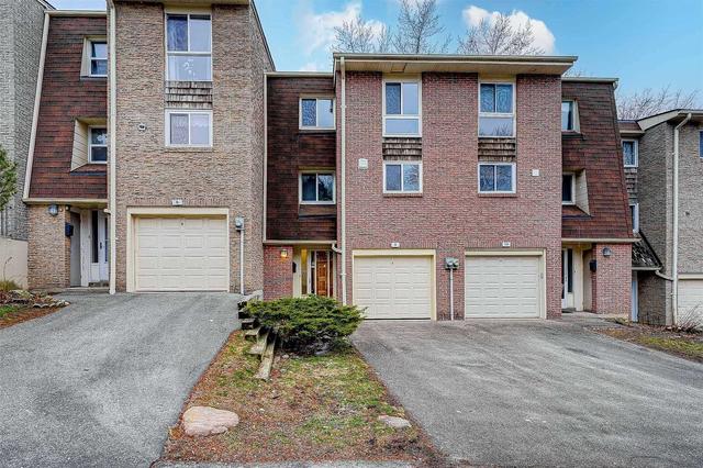 8 Rusty Crest Way, Townhouse with 3 bedrooms, 2 bathrooms and 2 parking in Toronto ON | Image 1